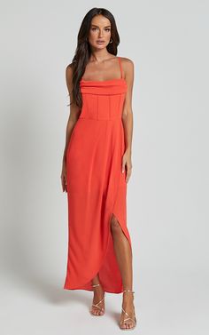 Turn heads in the stunning Andrina Midi Dress - a high low wrap corset dress that is perfect for any special occasion. This vibrant orange dress is made from luxurious polyester, giving it a sleek and polished look. The wrap style creates a flattering silhouette, while the corset detail adds an extra touch of elegance. With its sweetheart neckline and sleeveless design, this formal dress is both stylish and comfortable to wear. Whether you're attending a cocktail party, wedding as a guest or eve Orange Dress Outfit Wedding, Orange Dress Outfit, Orange Dress Outfits, Coral Cocktail Dress, Wrap Dress Styles, Cocktail Party Wedding, Bright Color Dresses, Outfit Wedding Guest, Style Formal