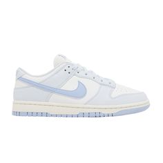 Find NIKE Wmns Dunk Low Next Nature ' Tint on Editorialist. The Nike Women’s Dunk Low Next Nature ‘Blue Tint’ is crafted from 20% recycled content by weight. The low-top features a synthetic leather upper that combines a white base with pale blue overlays at the forefoot and heel. Nike’s retro Sunburst logo graces the Volt-colored sockliner, while standard Nike branding hits decorate the woven tongue tag and back tab. An aged off-white finish is applied to the midsole, supported underfoot by a light blue rubber outsole. Cute Sneakers For School, Jordan 1 All Colors, Womens Nike Dunks Low, Light Blue Quince Shoes, Cute Nikes For Women, Shoe Inspo For School, Nike Low Dunks Women, School Shoes 2024, Cute Shoes For Back To School