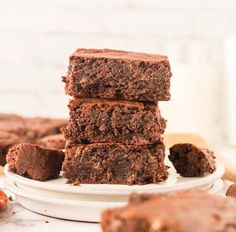 chocolate brownies stacked on top of each other