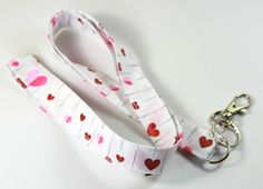 This cute lanyard has beautiful shinny hearts on white. It is perfect for any occasion. You can leave me a convoy if you need a different size. You can have a wardrobe of lanyard to match your outfit. This lanyard is made of soft 100% cotton fabric to give a comfortable feel around your neck. This lanyard is easy to take care. You can spot clean and throw in a washer and hang dry. If you want you can iron and it is ready to use. These lanyards are perfect if you have metal allergy. Each of these Cute White Lanyards For Gifts, Cute White Badge Holders For Gifts, Cute White Badge Holders For Gift, Cute White Badge Reel For Gift, Adjustable White Badge Holder As A Gift, Lanyard Pink, Cute Lanyard, Cute Lanyards, Dad In Heaven