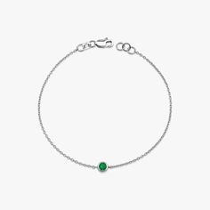 Our simple and elegant solitaire bracelet features a round cut natural emerald at its center. We can craft this bracelet in 14K or 18K Gold according to your preference.★ Bracelet Features• Gold Kt: 14K/18K Solid Gold (All pieces are stamped for authenticity)• Available Gold Colors: Yellow Gold, Rose Gold, White Gold• Center Round Cut Emerald Weight: 0.12 carat• We only work with real natural emeralds• We offer a signed certificate with each bracelet for the authenticity of the center emerald stone.• Center Diameter: 4.6 mm Diamond Stacking Rings Engagement, Solitaire Bracelet, Diamond Huggies, Emerald Bracelet, Diamond Stacking Rings, Rose Gold White, Gold Colors, Gold Ring Stack, Diamond Chain