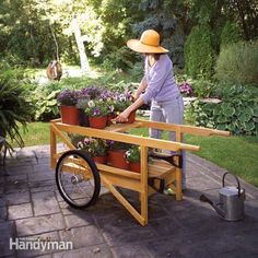 build your own garden cart for hauling everything from bags of mulch to flats of flowers. made from durable, straight-grain white ash, this heirloom cart will be a garden workhorse for years. Garden Wood Projects, Outdoor Woodworking Projects, Garden Wood, Flower Cart, White Ash, Beginner Woodworking Projects, Soil Improvement