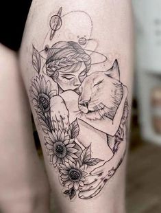 a woman with a cat and sunflowers tattoo on her thigh is holding onto the arm