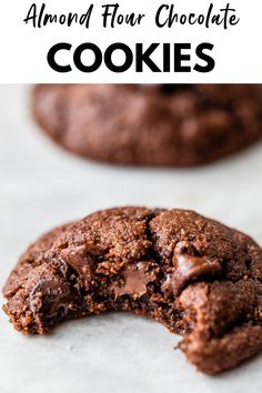 a chocolate cookie is cut in half to show the inside