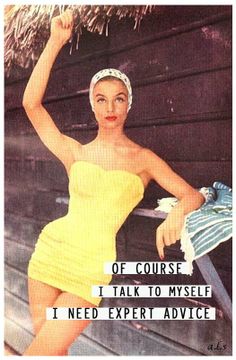 a woman in a yellow dress posing with a straw hat on her head and holding a towel over her shoulder