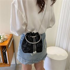 Specification: Material: CanvasSize: 15*17*9cm Color: White,Black,Blue,PinkStraps: 1Usage: Shoulder Bag, Handbag,Crossbody bags [23y 8m 29d] Black Shoulder Bag With Chain Strap For Gift, Black Shoulder Bag With Chain Strap As Gift, Black Chain Pouch Bag, Trendy Black Evening Bag With Chain, Black Chain Pouch Shoulder Bag, Black Bucket Bag With Chain Strap, Black Bucket Shoulder Bag With Chain Strap, Black Bucket Bag With Chain Strap For Evening, Trendy Black Bucket Bag With Chain Strap