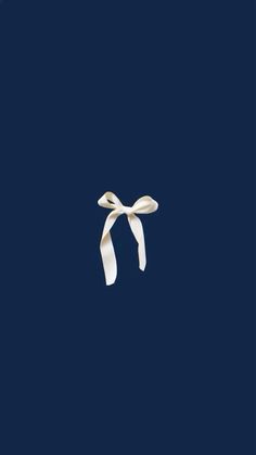 a white ribbon on a dark blue background