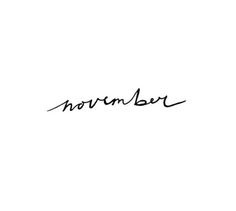 the word november written in cursive writing on a white background with black ink