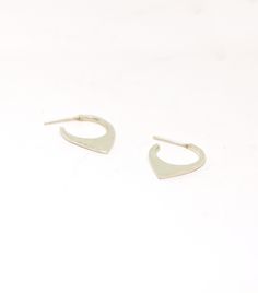 This pair of hoops are made from sterling silver and they come with butterfly ear backs. They are 20 mm long and 15 mm wide. If your ears can handle a bigger gauge I can make this pair a sleeper one without the need to have an ear back. If you prefer it smaller, have a look here: https://www.etsy.com/listing/628994062/small-hoops-sterling-silver-geometric?ref=shop_home_active_9&crt=1 Each pair is handmade to order and may slightly vary from the pictures. Please allow for subtle variations ma Modern Small Hoop Cartilage Earrings Tarnish Resistant, Modern Huggie Hoop Earrings, Modern Nickel Free Cartilage Earrings For Everyday, Modern Nickel-free Cartilage Earrings For Everyday, Modern Nickel-free Everyday Cartilage Earrings, Modern Small Hoop Cartilage Earrings, Modern Everyday Huggie Earrings, Minimalist Polished Sterling Silver Huggie Earrings, Modern Sterling Silver Teardrop Huggie Earrings