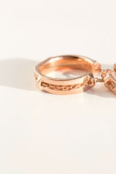 Inspired by handcuffs and the theme of duality and infinity. The bands are hinged at the sides making it flexible and adapts to the shape of your finger comfortably. The two rings are joined at the center with links. A delicate chain sits on the outside of the bands in a shallow groove. Rosegold vermeil. Made in the USA. 2 Finger Ring, Two Rings, Parsons School Of Design, Shape Of You, Delicate Chain, Finger Ring, Ring Finger, Custom Items, Body Jewelry