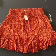 Loft, Medium, Burnt Orange With White Polkadot Skirt And Ruffled Hem. Never Worn. Great Condition. Summer Casual Polka Dot Skirt, Polka Dot Bottoms For Vacation In Spring, Trendy Polka Dot Summer Skirt, Summer Polka Dot Flowy Skirt, Summer Polka Dot Mini Bottoms, Trendy Polka Dot Skirt For Summer, Casual Polka Dot Mini Bottoms, Summer Polka Dot Skirted Bottoms, Polka Dot Skirted Bottoms For Summer