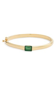 Polished 14-karat gold plates this minimalist bangle centered by an inset stone. 6 3/4" inner circumference; 1/8" width; 1/4"W x 3/8"L setting Hinge with tongue-and-groove closure and safety clasp Due to natural variations, stone color may vary 14k-gold plate/rose quartz, amazonite or green onyx Imported Minimalist Bangle, Gold Plates, Stone Bangle, Tongue And Groove, Green Onyx, Womens Jewelry Bracelets, Stone Color, Rose Quartz, Onyx