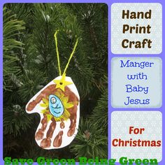 a handprint christmas ornament hanging from a tree