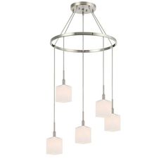 three light chandelier with white glass shades on the bottom and four lights above it