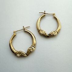 Presenting a beautiful pair of everyday hoops earrings. Ram heads are a symbol prevalent in Etruscan, Egyptian and other cultures, has stood for sacrifice, power, new life and creative energy. Vintage 14K Gold Rams Head Hoops Earrings measure approximately 1" inch from top to bottom total 1.79grams Rams Head, Ram Head, Hoops Earrings, Jewelry Inspo, Jewelry Earrings Hoops, Creative Energy, New Life, 1 Inch, Ram