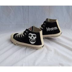 Introducing our 'Unique Hand-Painted Misfits Punk Rock Band Shoes: A Street Art Collection' - where fashion meets rebellion, and style gets a punk rock makeover. These custom sneakers are not just footwear; they are a canvas of individuality and self-expression. Our personalized gift to you is the freedom to wear your passion. Each pair is a masterpiece, meticulously hand-painted with iconic Misfits artwork, infusing punk rock style into every step you take. These shoes are a tribute to the legendary rock band, capturing their spirit in wearable art. Elevate your fashion game with these running shoes that embody the rebellious ethos of punk rock culture. They are more than just sneakers; they are a statement. Perfectly blending street art and rock 'n' roll vibes, these shoes are your ticke Alternative Black Sneakers For Streetwear, Alternative Lace-up Sneakers For Streetwear, Black Punk Sneakers For Concert, Black Punk Sneakers For Streetwear, Alternative High-top Sneakers For Streetwear, Misfits Artwork, Casual Sneakers For Concert With Round Toe, Casual Sneakers With Round Toe For Concerts, Casual Halloween Skateboarding Sneakers