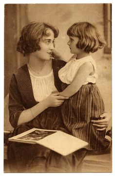 an old photo of two women sitting next to each other with a quote on it