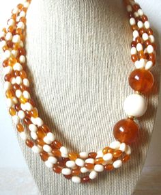 Vintage 18" Necklace, Cream Golden Honey, Lucite Beads, Multi Strand 52016 Six strands Gold toned closure Previously owned and In very good Vintage condition. Please, contact us if you any questions. Beautiful necklace! Please see my other listings for more vintage jewelry- I am happy to combine the shipping. Thanks so much!  Beautiful necklace! Please see my other listings for more vintage jewelry- I am happy to combine the shipping. Thanks so much! Cheap Gold-tone Multi-strand Necklace, Golden Honey, Thanks So Much, Beaded Necklaces, Beautiful Necklace, Multi Strand, Columbus, Beautiful Necklaces, Vintage Jewelry