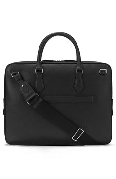 Crafted from textured Saffiano leather, this refined case is a statement addition with impeccable style for your organization essentials. Top carry handle; removable, adjustable crossbody strap Fits most 13" laptops Leather Made in Italy Black Briefcase With Detachable Handle For Business Trips, Modern Black Saffiano Leather Briefcase, Classic Briefcase With Silver-tone Hardware, Classic Briefcase With Silver-tone Hardware For Work, Classic Formal Briefcase With Silver-tone Hardware, Designer Office Briefcase With Detachable Handle, Black Saffiano Leather Briefcase For Work, Elegant Travel Briefcase With Silver-tone Hardware, Black Briefcase With Silver-tone Hardware For Business