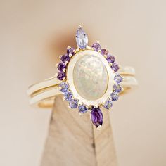 Opal And Amethyst Ring, Purple Oval Cabochon Jewelry For Wedding, Purple Oval Cabochon Wedding Jewelry, Oval Opal Ring With Gemstone Accents For Wedding, Gold Gemstone Wedding Rings, Oval Opal Engagement Ring, Purple Engagement Rings, Neutral Vibes, Dope Jewelry Accessories