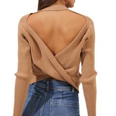 Description ASTR The Label Prescott Backless Sweater - Camel features a ribbed soft material with a mock turtleneck and easy fit. Materials: 67% Acrylic, 33% Nylon High neckline Backless Care: Dry clean only *All sale items are FINAL SALE Size Chart Brand Bio Taking inspiration from the latest trends and affinity for all things feminine, the creative collective behind ASTR The Label aims to immerse their customers into a world of effortless beauty. Since 2012, the brand has stood as a wearable i Backless Sweater, Cross Sweater, Taupe Sweater, Cutout Sweater, Camel Sweaters, Astr The Label, High Neck Sweater, Ribbed Knit Sweater, Mock Turtleneck