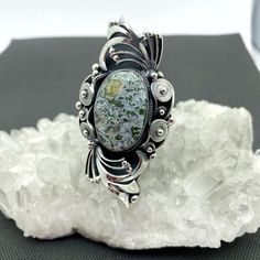 Handmade silver ring with natural stone agate. This is a perfect gift for the mother, grandmother, and loved ones. The ring is large and very comfortable to wear. The ring size is adjustable, so you can give it a gift without knowing the size. Perfect design, modern look and high quality. All our jewelry is made of high-quality sterling silver and has a stamp of 925 ▶RING WEIGHT: 19.3 gr Length: 58 mm Width: 31 mm 1 inch = 25.4 mm 1 pound = 453.6 grams ⦿ Attention: The color of the stones may di Oval Agate Jewelry For Anniversary, Unique Silver Ring For Memorial, Agate Jewelry With Large Stone For Anniversary, Unique Silver Moss Agate Jewelry, Anniversary Jewelry With Large Agate Stone, Nature-inspired Silver Rings With Large Stone, Moss Agate Ring With Natural Stones, Nature-inspired Rings With Large Stone In Sterling Silver, Nature-inspired Sterling Silver Rings With Large Stone