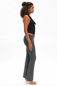 Our best-selling Silence + Noise pant in a standout shimmering knit. Designed with a mid-rise waistline that hits at the natural waist, slim fit though the hips and thighs and kick-flare hem. Find them only at Urban Outfitters. Features Silence + Noise Bella shimmer pull-on knit flare pant Mid-rise trouser Soft and stretchy metallic shimmer knit Mid-rise waistline Slim fit through waist and seat Flare fit Full length Easy pull-on style UO exclusive Content + Care 83% Polyester, 14% fiber, 3% spa Glamorous Tight Bottoms For Night Out, Flattering Stretch Bottoms For Night Out, Elegant Fitted Shimmer Bottoms, Elegant Shimmer Fitted Bottoms, Sleek Bottoms With Elastic Waistband For Night Out, Flattering Fitted Bottoms For Night Out, Chic Shimmer Stretch Bottoms, Shimmer Pants For Fall, Fitted Shimmer Bottoms For Fall