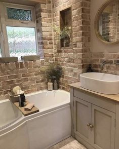 a bath room with a sink and a bath tub