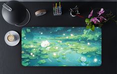 a mouse pad with an image of a cat in the water surrounded by lily pads