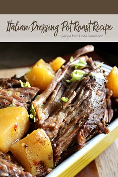 a plate full of food with potatoes and meat in it on top of a wooden table