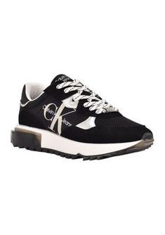 Classic and essential, the Calvin Klein Magalee sneaker is an elevated take on the retro lace up sneaker. Its detailed with color blocking and pops of color on the sole. The Calvin Klein Jeans logo is features on the side. | Calvin Klein Women's Magalee Casual Sneakers, Black, 8M Calvin Klein Outfits, Casual Logo, Calvin Klein Jeans Women, Jeans Logo, Calvin Klein Shoes, Sneakers Athletic, Calvin Klein Woman, Casual Lace, Shoes With Jeans