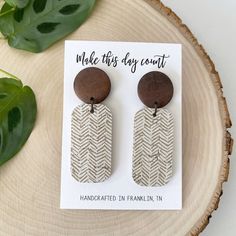 Dress up your look with these neutral gold herringbone cork leather and wood earrings.  They are lightweight and made with nickel free, lead free, hypoallergenic posts.  They come ready to gift with box and twine. DETAILS: * Walnut wood * Genuine Leather * Hypoallergenic post with silicone back * 3/4 inches wide with a 2 1/2 inch drop Each pair is handmade and will have slight variations due to the patterned design of the leather. Thank you for taking the time to check out my shop  Please feel f Natural Earrings, Polymer Clay And Wood Earrings, Wood And Clay Earrings, Wood And Leather Earrings, Wooden Earrings Handmade, Wood Polymer Clay Earrings, Cork Earrings, Cork Leather Earrings, Unique Natural Wood Earrings