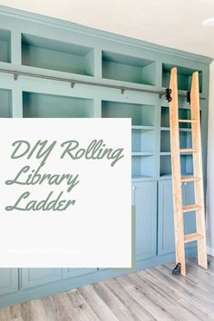 a ladder leaning against a blue bookcase with the words diy rolling library ladder