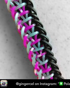 a close up of a pink and blue braid on a white background with text overlay