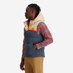 The Epic Fader Puffer Vest is the ultimate fusion of function and fashion. With its vibrant, vintage-inspired exterior and cozy layer of soft micro-flannel on the inside, this retro puffer vest looks as good as it feels. The fill is 100% polyester and the outside fabric is a plush, water-resistant cotton. Additional features are 2 inside pockets and high-quality YKK® Zippers. Get one now and let your retro style shine! Female Model is 5'10" / 130 lbs and is wearing a size XS Male Model is 5'11" Winter Outdoor Vest With Fleece Lining, Casual Cotton Puffer Jacket With Double-lined Hood, Casual Fall Vest With Detachable Hood, Outdoor Cotton Puffer Jacket With Detachable Hood, Outdoor Vest With Detachable Hood For Fall, Outdoor Cotton Puffer Jacket With Fleece Lining, Cotton Puffer Jacket For Outdoor Fall Activities, Cotton Puffer Jacket With Double-lined Hood For Fall, Outdoor Fall Vest With Detachable Hood