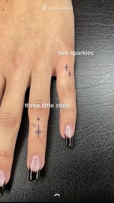 a woman's hand with two small stars on it and the words, three little stars