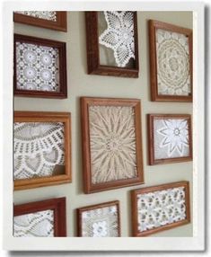 there are many pictures on the wall with crocheted doily in them,