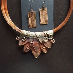 Antiqued Copper Necklace And Earring Set. Handmade By Local Independent Artist . Earrings Are French Hook. Necklace Is 17.5 Inches Long Not Including The Vintage Clasp Closure. The Set Retailed For $470 And Was Purchased At A Local Craft Fair. No Trades Or Modeling. Comes From A Smoke And Pet Free Home. No Lowball Offers Please. Thank You! Unique Nickel-free Brown Jewelry, Unique Brown Nickel-free Jewelry, Elegant Brown Copper Wire Jewelry, Unique Brown Metal Jewelry, Brown Pendant Costume Jewelry, Brown Costume Jewelry Pendant, Elegant Brown Soldered Jewelry, Brown Pendant Jewelry With Unique Variations, Brown Metal Pendant Jewelry