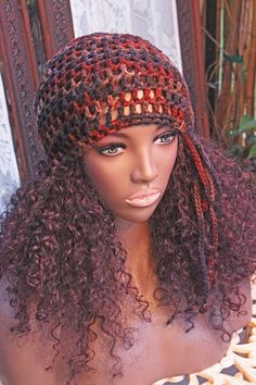 a mannequin head wearing a crochet hat