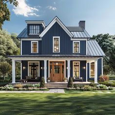 a blue house with white trim and windows