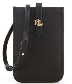 From Lauren Ralph Lauren&#x2C; the Leather Crossbody Tech Case features: Keep your phone within reach while remaining hands-free with Lauren Ralph Lauren’s crossbody tech case&#x2C; which is designed with an adjustable crossbody strap&#x2C; two exterior credit card slots&#x2C; and an easy snapped closure. Centered by polished signature hardware&#x2C; this on-the-go accessory is realized in supple full-grain leather&#x2C; which is Elegant Leather Rectangular Phone Accessories, Classic Black Phone Bag With Cell Phone Pocket, Elegant Black Mobile Phone Bag Accessories, Wallet Inspiration, Tech Cases, Ralph Lauren Leather, Ralph Lauren Style, Signature Hardware, Crossbody Wallet