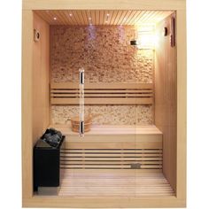 a wooden sauna with two benches and a trash can