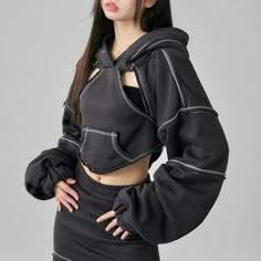 'Raven' Cropped Irregular Cutout Hoodie - AlielNosirrah Tech Wear Crop Top, Minimalist Futuristic Fashion, Hoodie Around Waist, Hands On Chest Reference, Futuristic Jacket, Dark Streetwear, Futuristic Clothing, Outfits Unique, Futuristic Style