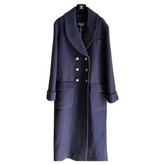 Chanel Wool navy coat. New with tag. 90% wool 10% cashmere 100% silk- lining Size 44. Luxury Navy Peacoat With Button Closure, Luxury Navy Peacoat With Double Button Closure, Luxury Business Peacoat With Button Closure, Designer Wool Peacoat For Work, Luxury Double-breasted Wool Coat, Luxury Double Button Peacoat For Work, Luxury Single-breasted Peacoat For Office, Luxury Office Peacoat With Double Button Closure, Luxury Blue Double-breasted Peacoat