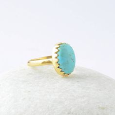 Arizona Turquoise Ring, Arizona Turquoise 10x14mm Oval Zig Zag Bezel Gemstone Ring, Sterling Silver Ring, Wedding Gift For Women Item Code: BF5041 Metal: 925 Sterling Silver Plating: 18k Gold Plated Stone Detail:- Arizona Turquoise 10x14mm Oval * Please note that there will be slight variations in stone texture and color shades in the actual product that you receive. Stone quality or grade will be same. * All our jewelry is Micron Plated which is higher quality as compared to Standard Plating NO Green Turquoise Oval Ring For Wedding, Adjustable Gold Turquoise Ring For Wedding, Green Oval Turquoise Wedding Ring, Turquoise Birthstone Ring For Wedding, Turquoise Gemstone Wedding Ring, Gold Turquoise Wedding Ring, Elegant Handmade Turquoise Wedding Ring, Adjustable Turquoise Gemstone Ring For Weddings, Turquoise Ring For Wedding