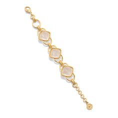 This versatile piece elevates the classic chain bracelet with an unexpected twist, artfully rendered with understated clear quartz beads and a subtly ornate gold motif for a dash of drama. Inspired by the effortless-yet-impeccable style that my fabulous French aunt achieves every day, who is able to take everything from a ballgown to a t-shirt, and make a moment of it. Pair with our Blandine Chain necklace to complete the look. Elegant White Chain Bracelet With Solid Link, Elegant White Chain Bracelet, Elegant Clear Jewelry With Adjustable Chain, Elegant Clear Jewelry With Chain, Elegant Gold Faceted Chain Bracelet, Gold Motif, Quartz Beads, Clear Quartz, Chain Bracelet