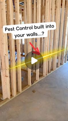 a room with wooden framing and a sign that says pest control built into your walls?