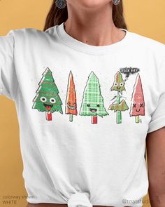 "Find your Christmas party outfit for that ugly sweater party, the Christmas tree farm, or family holiday winter gathering with this witty Christmas Tree t-shirt. AS A SWEATSHIRT : https://toatstudio.etsy.com/listing/1128205795 FABRIC CONTENT:  - Fabric content varies based on color. Solid colors are 100% cotton, heather colors are 52% cotton/48% polyester, Athletic Heather and Black Heather are 90% cotton/10% polyester) - Light fabric (4.2 oz/yd² (142 g/m   FIT & CONSTRUCTION :  - Runs true to size (sizing runs slightly larger for women, as this is a unisex style) - Side seams help hold the garment's shape longer and give structural support - Highly elastic ribbed knit collar and neck seam helps retain neck shape  - Reinforced shoulder and neck seams stabilize the back of garment and prev Fun Christmas T-shirt For Holiday, Green Christmas T-shirt For Holiday, Green T-shirt For Christmas Holiday, Fun White T-shirt For Holiday, Fun White Christmas Tops, Fun Christmas Graphic Print Tops, Fun Short Sleeve Winter Tops, Green Graphic Print Top For Holiday, Playful Cotton Holiday Tops