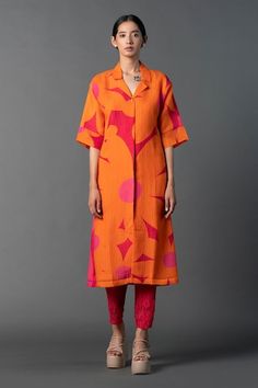 Orange straight cut shirt kurta with pink geometric prints. Paired with coordinating straight pant and satin inner top. - Aza Fashions Pink Printed Blouse For Spring, Spring Pink Blouse With Printed Motifs, Pink Block Print Sets For Spring, Spring Pink Block Print Sets, Spring Block Print Pink Sets, Pink Straight Kurta Top For Summer, Fitted Pink Top With Printed Motifs, Geometric Prints, Cut Shirt