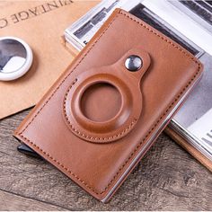 Tired of bulky wallets and constantly misplacing your cards? Tag Wallet is the perfect solution for you. Leather Card Holder Wallet, Smart Wallet, Apple Airtag, Rfid Wallet, Apple Brand, Travel Wallet, Leather Card Case, Leather Card Holder, Money Bag